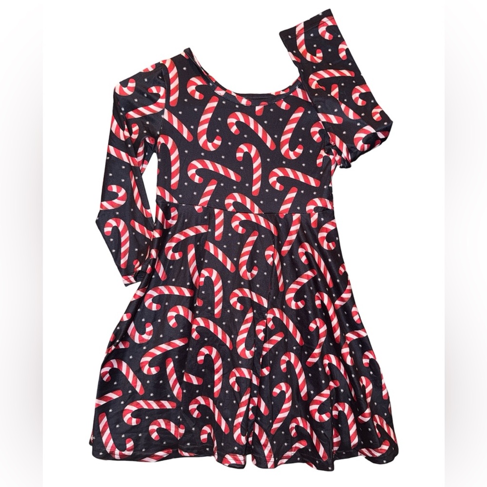 Boutique candy cane dress on a black background